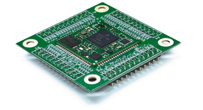 SOMRT1061 200 IR system-on-module soldered to a board with 0.1 inch headers for rapid prototyping
